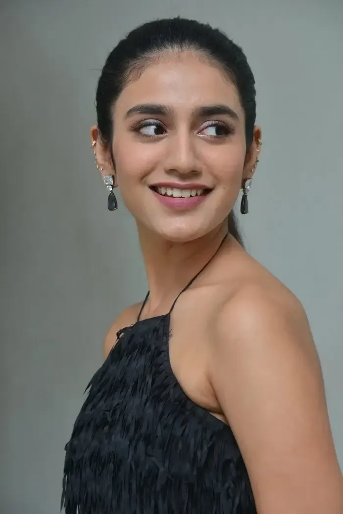 TELUGU ACTRESS PRIYA PRAKASH VARRIER IN SLEEVELESS BLACK GOWN 8